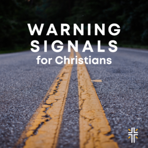 road with text "Warning Signals for Christians"