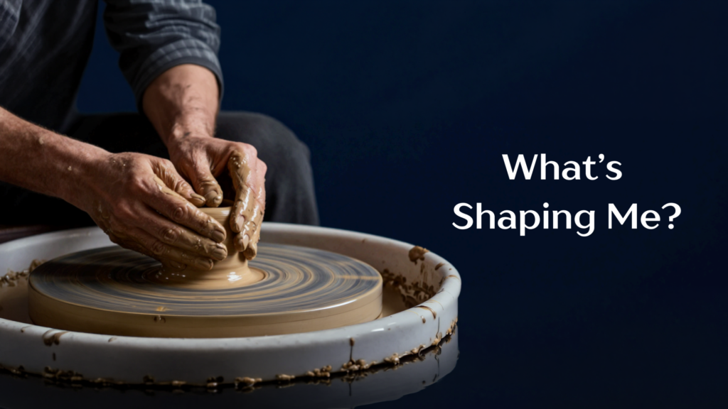 Man sitting at a pottery wheel shaping clay. Text on graphic says, "What's Shaping Me?"